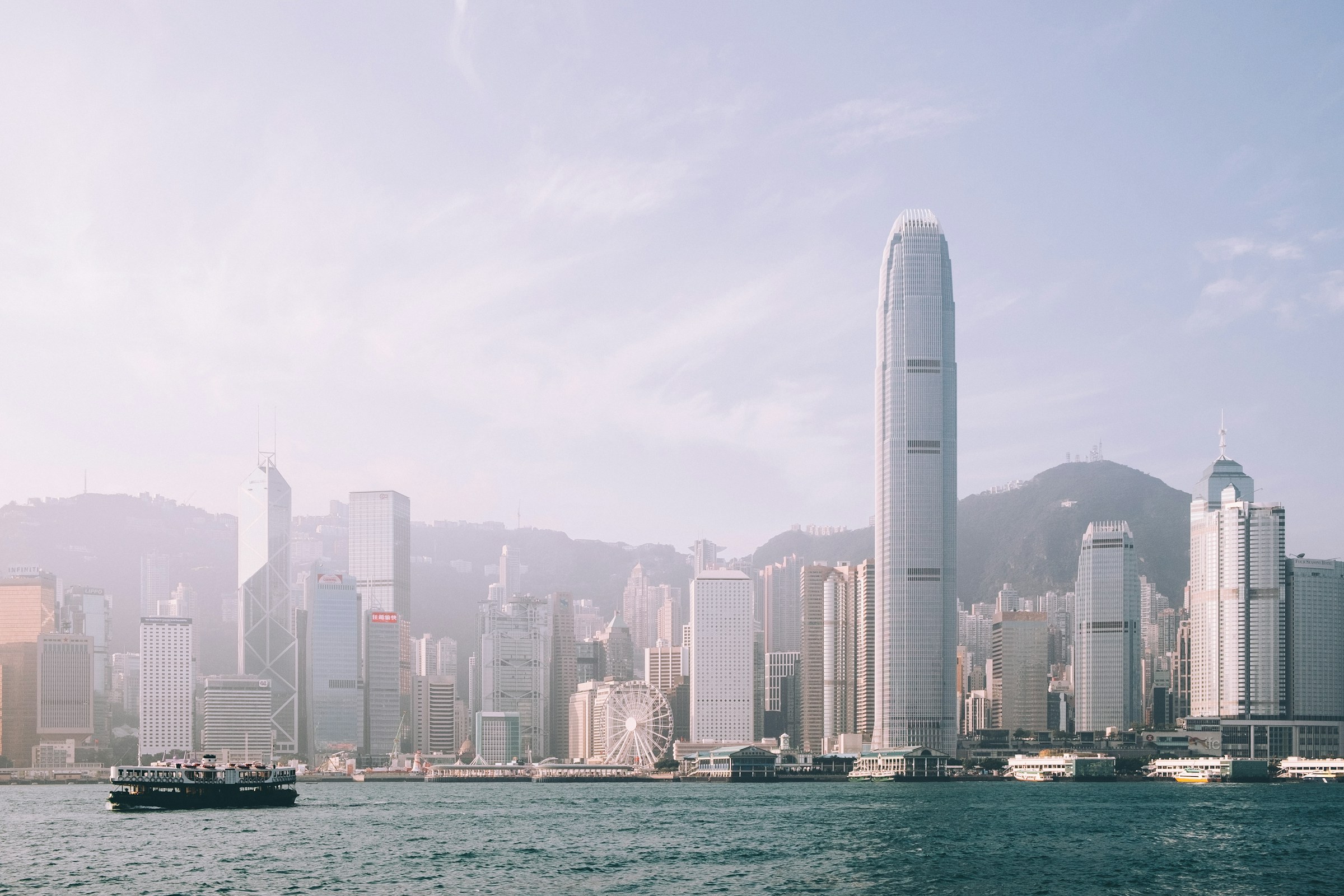 Victoria Harbour and the Hong Kong Island skyline, with a Star Ferry crossing the water